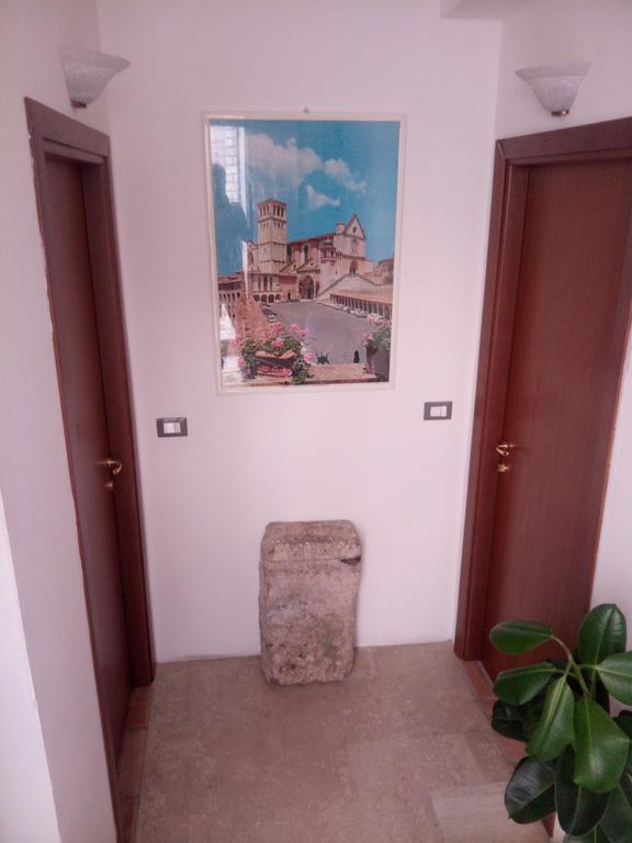 Le Case Di Tiberio Assisi Bagian luar foto