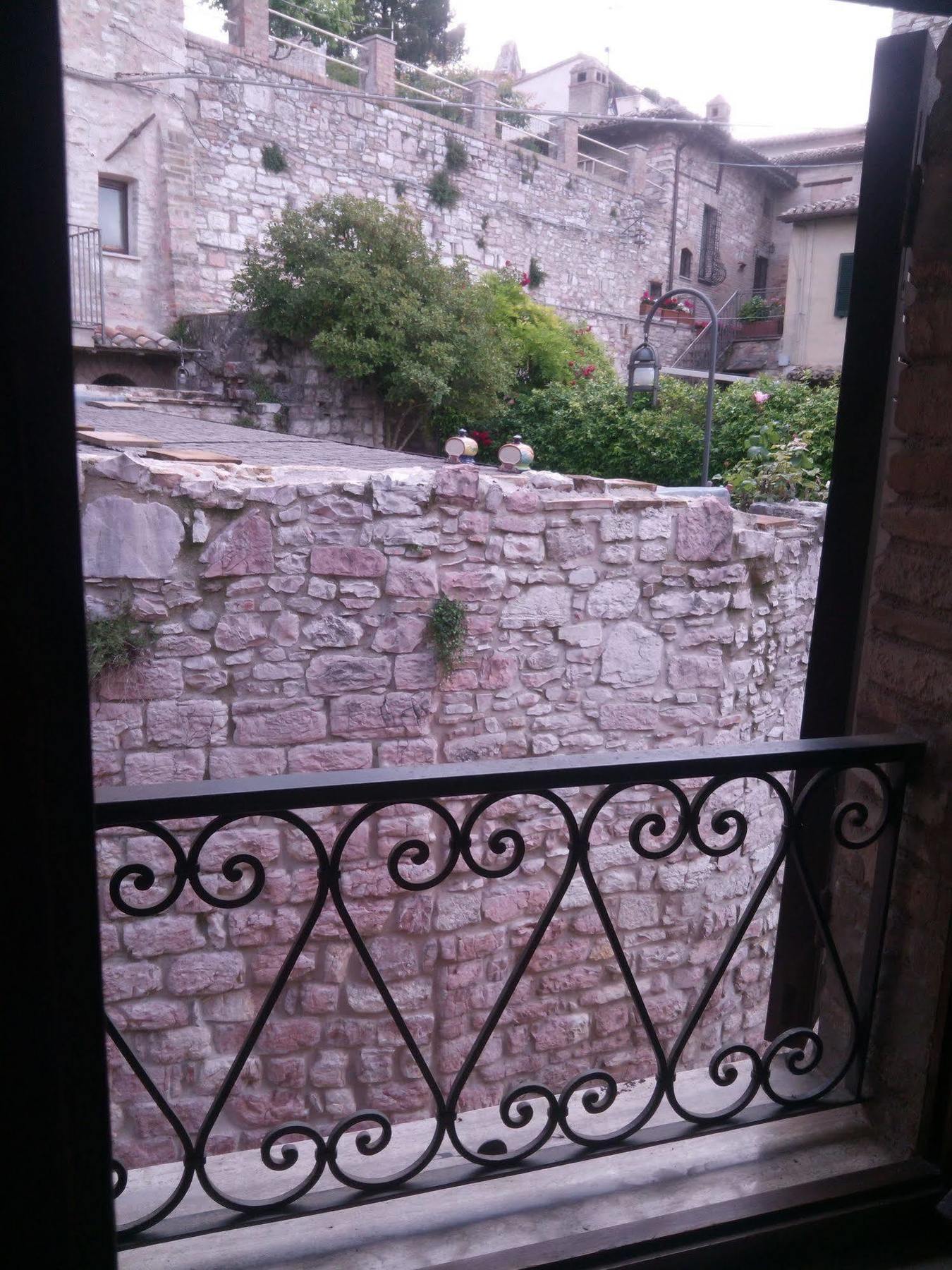 Le Case Di Tiberio Assisi Bagian luar foto